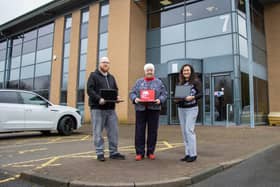 (l-r) Dean Chesney, Service Desk Analyst at Somerset Bridge Group, Cllr Alison Smith, Portfolio Holder for Corporate Services and Equalities at Sunderland City Council, and Manila McClean, Chief Information Officer at Somerset Bridge Group, with some of the donated laptops.